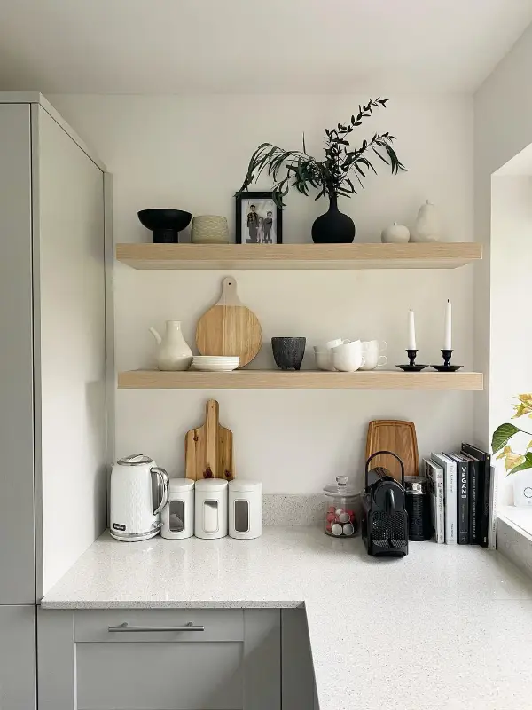 27 Creative Boho Kitchen Apartment Small Space Ideas to Maximize Style 21 Black Ceramics Against Pale Oak Shelves Never Go Out of Style